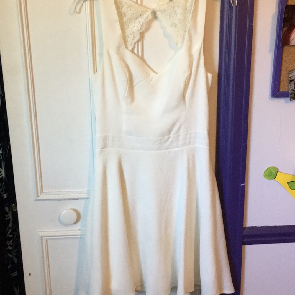 White lacy open back sleeveless dress